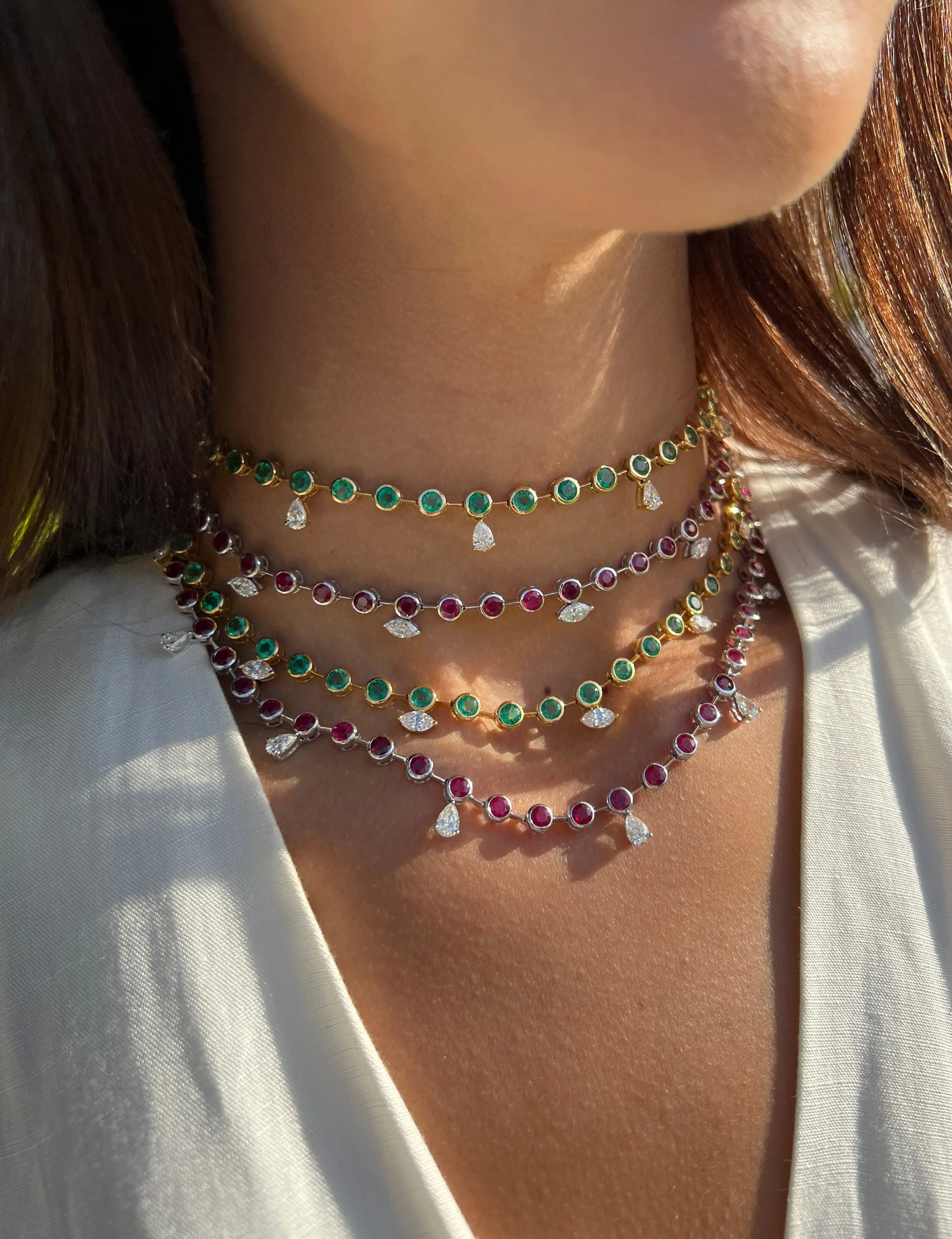 Round rubies with marquise diamond choker
