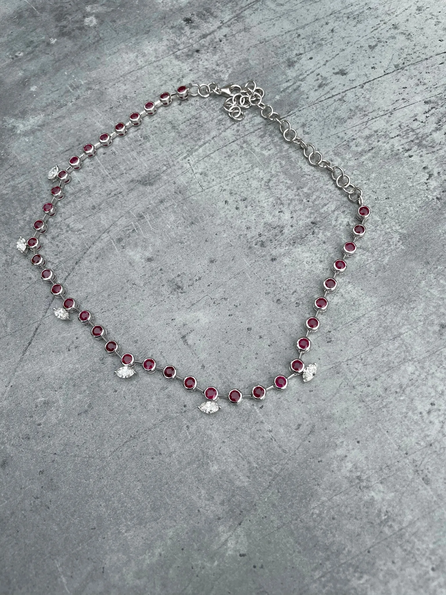 Round rubies with marquise diamond choker