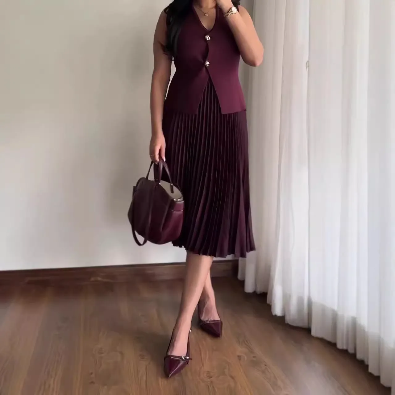 Sophisticated Buttoned Vest and Pleated Skirt Two-Piece Set